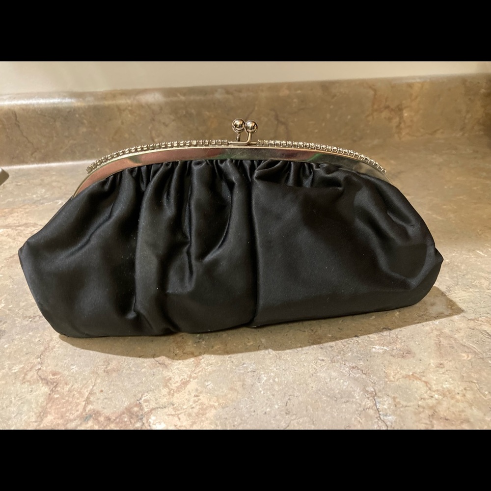Vintage black satin clutch purse. Rhinestones line the top latch